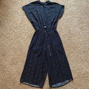 Cropped leg jumpsuit with button and tie front